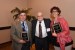 Dr. Nagib Callaos giving Prof. Gabriela Vilanova and Prof. Jorge Varas a plaque "Por su Excelente Ponencia Plenaria."